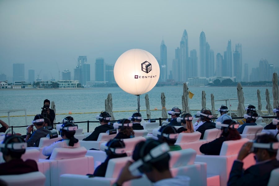 Sphere labeled "M CONTENT" with VR audience.