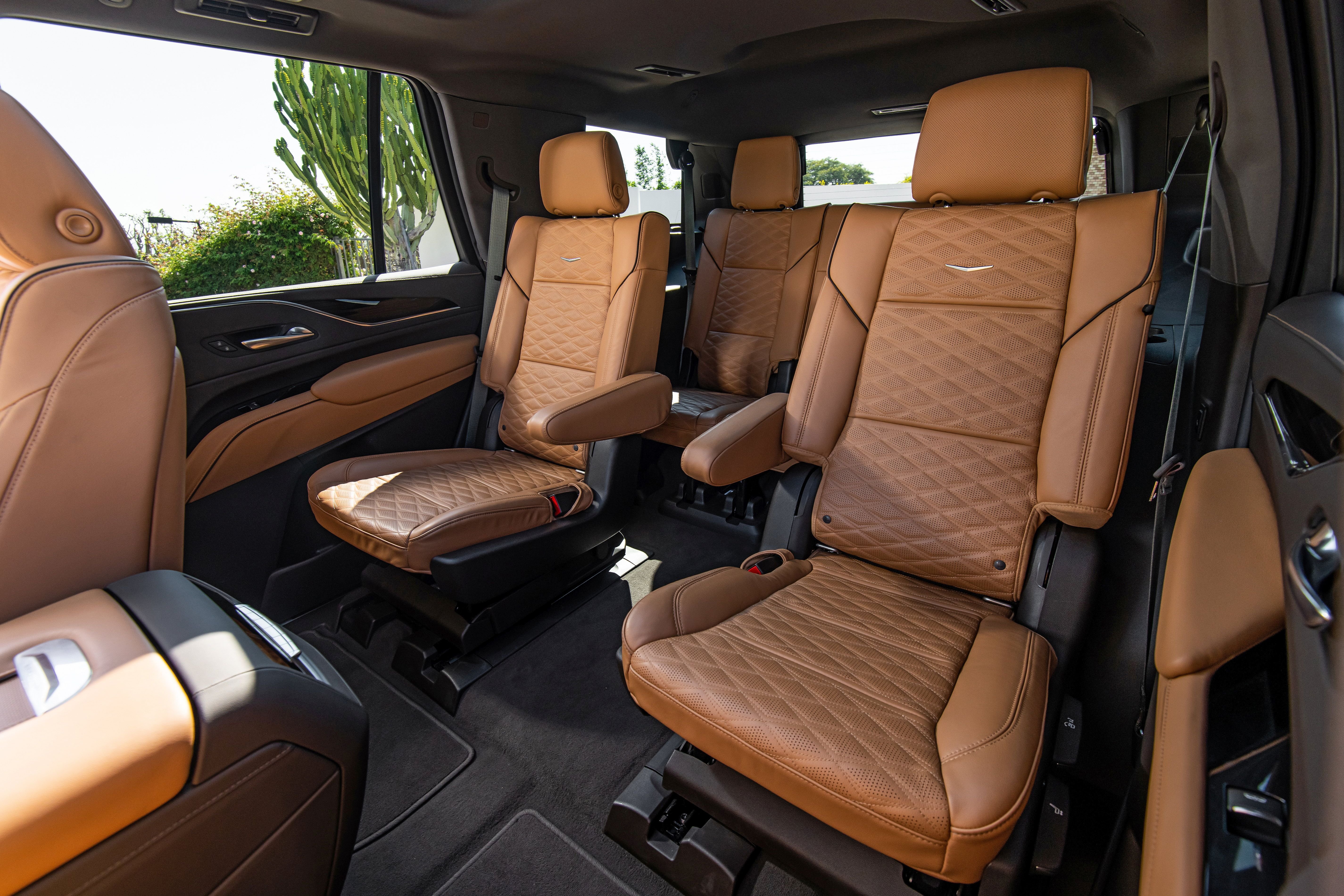 Tan leather seats in luxury SUV interior.