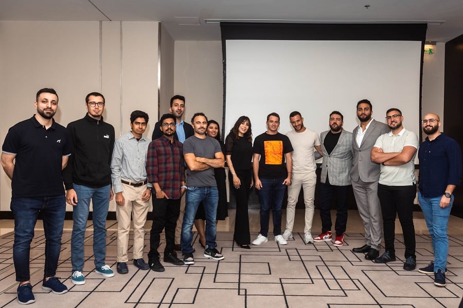Group photo in a conference room.