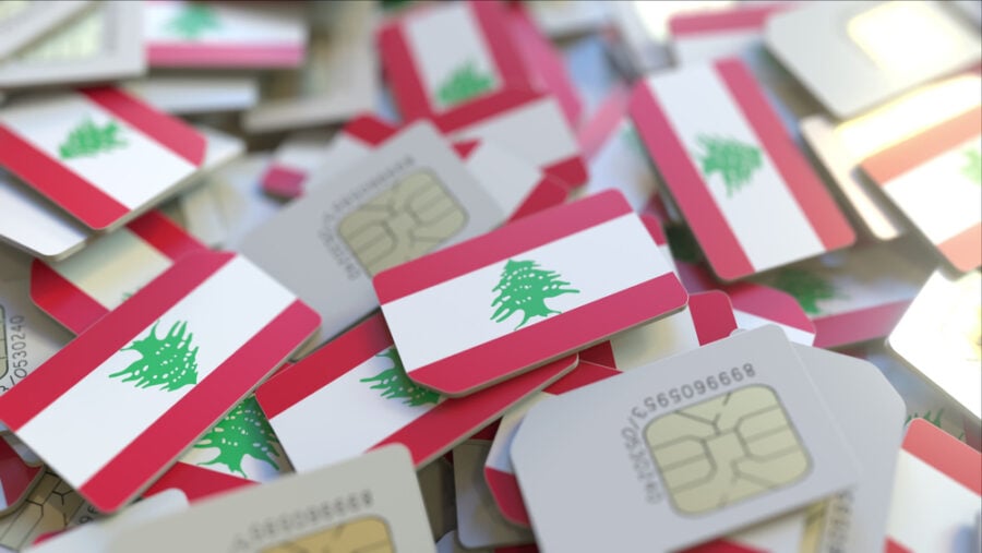 Lebanese SIM cards arranged with the Lebanese flag.