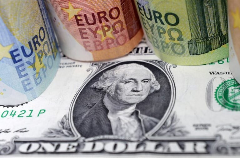 Euro drops below 2002 low