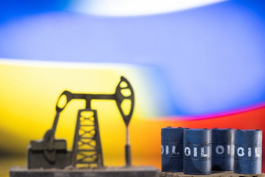 Oil prices edge up from 6-month lows after drop in U.S. stockpiles