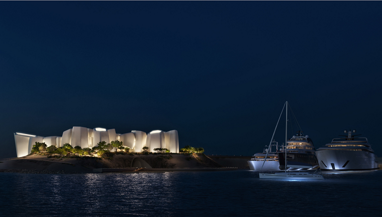 Modern illuminated building on a small island at night with nearby yachts.