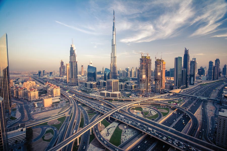Highway near Burj Khalifa at sunset.