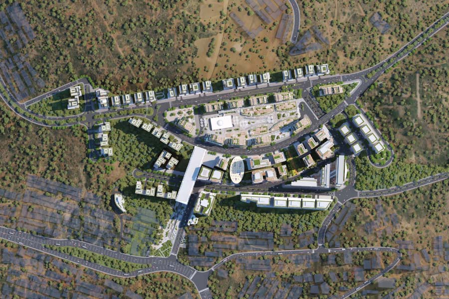 Residential development in a hilly, wooded area with planned buildings.