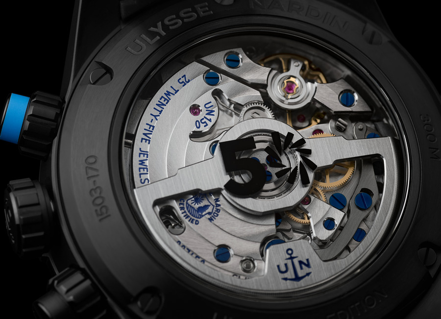 Watch gears and "Ulysse Nardin" inscription.