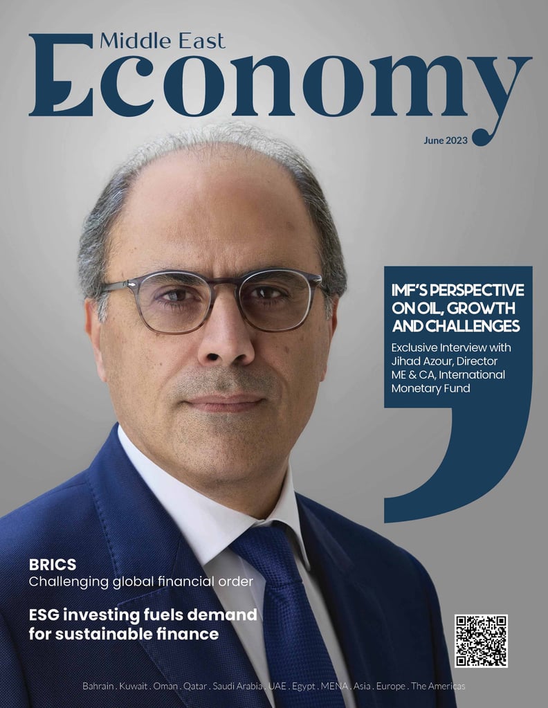 Man in suit featured on Middle East Economy magazine cover.