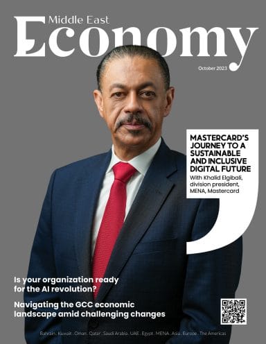 Man in a suit on the cover of Middle East Economy magazine, October 2023.