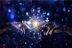 Hands reaching for a glowing sphere surrounded by digital icons.