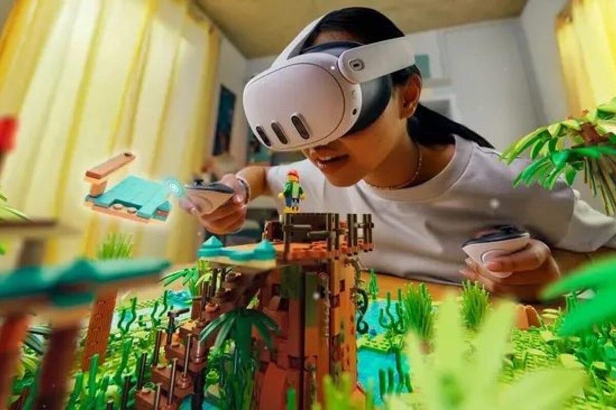 Person in VR headset builds in a virtual tropical space.