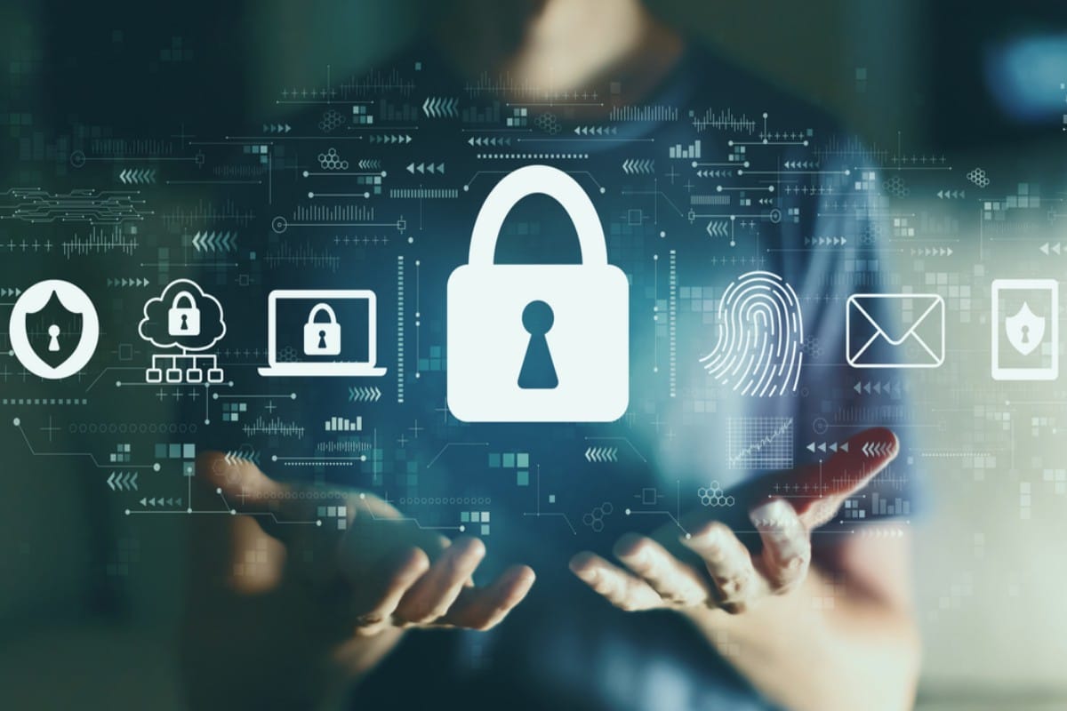Hands holding a digital padlock with security icons in a tech-themed background.