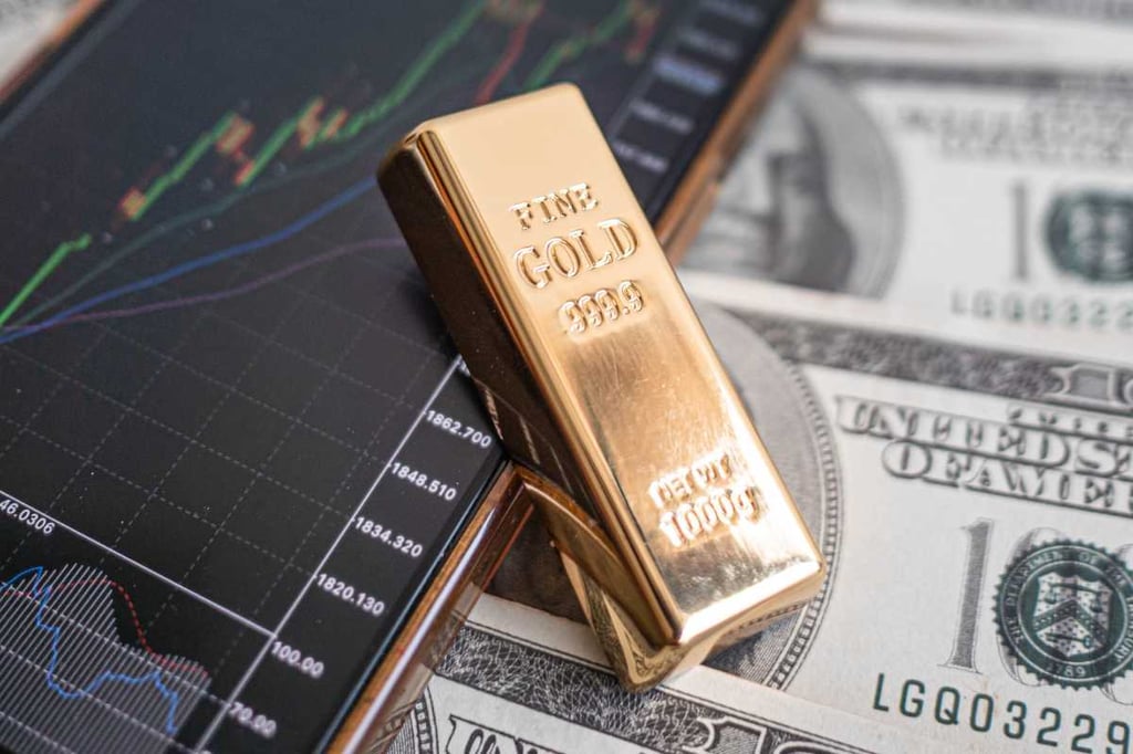 Gold prices decline as stronger dollar curbs appeal