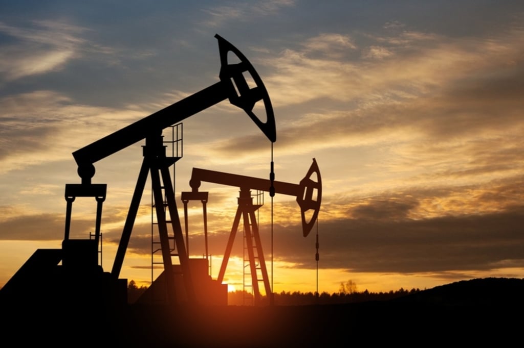 Oil prices hold near four-and-a-half month high on reduced exports, market caution