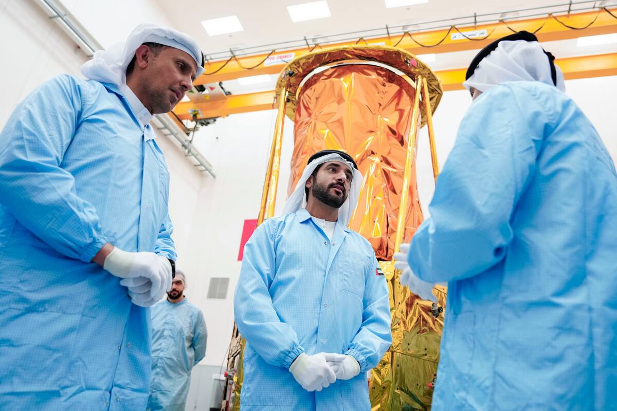 Sheikh Hamdan at MBR Space Center on a tour of MBZ-SAT.