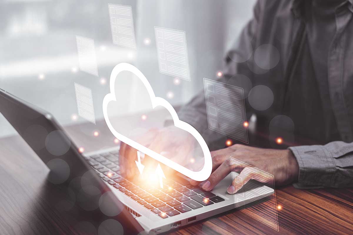 Data transfer between laptop and cloud shown visually.