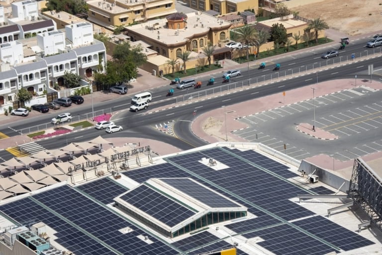 How is UAE balancing oil production growth with renewable energy ambitions